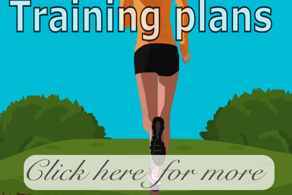 Bottom view of a person running through a green field with a bush on each side and a clear blue sky overhead